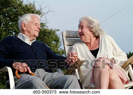 94 year old man with his wife enjoying sunset on dock. Medevi, Sweden View Large Photo Image Stock Image - 94 year old man with his wife enjoying sunset on dock. Medevi, Sweden. Fotosearch