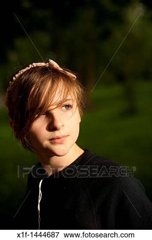 A 12-13 year teenage old girl, outdoors UK View Large Photo Image Stock Photo - A 12-13 year teenage old girl, outdoors UK. Fotosearch