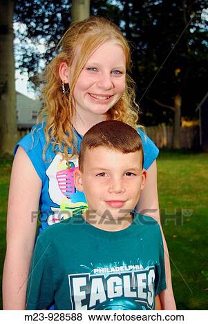A 12-year-old girl and a 9-year-old boy, sister and brother, Pennsylvania, USA View Large Photo Image Stock Photo - A 12-year-old girl and a 9-year-old boy, sister and brother, Pennsylvania, USA. Fotosearch