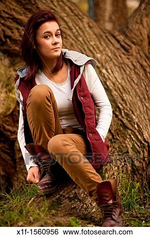 A 14 15 year old caucasian teenage girl, UK, outdoors, autumn, woodland View Large Photo Image Stock Photograph - A 14 15 year old caucasian teenage girl, UK, outdoors, autumn, woodland. Fotosearch