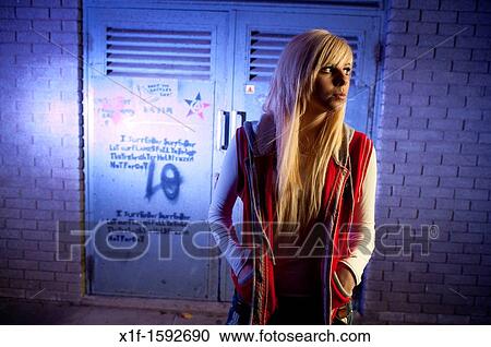 A 16 year old blonde haired slim teenage girl, alone in a dingy urban location, UK View Large Photo Image Stock Image - A 16 year old blonde haired slim teenage girl, alone in a dingy urban location, UK. Fotosearch