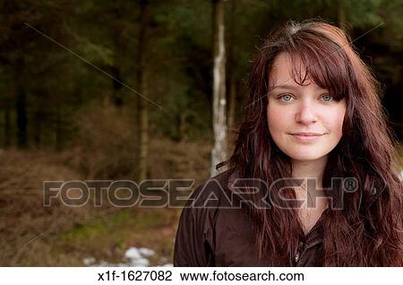 A 16 year old brown haired teenage girl, outdoors, winter afternoon, UK View Large Photo Image Stock Image - A 16 year old brown haired teenage girl, outdoors, winter afternoon, UK. Fotosearch