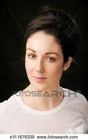 A 20 year old slim attractive healthy young adult woman girl with brown hair and eyes View Large Photo Image Stock Photo - A 20 year old slim attractive healthy young adult woman girl with brown hair and eyes. Fotosearch