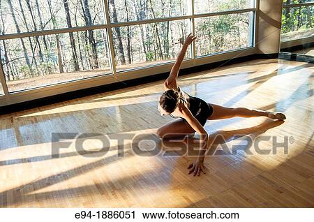 A 22 year old brunette female dancer doing a dance move indoors indoors View Large Photo Image Stock Image - A 22 year old brunette female dancer doing a dance move indoors indoors. Fotosearch