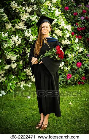 A 22 year old woman in a portrait on her university graduation day. View Large Photo Image Stock Image - A 22 year old woman in a portrait on her university graduation day.. Fotosearch