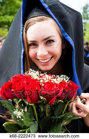A 22 year old woman in a portrait on her university graduation day. View Large Photo Image Stock Image - A 22 year old woman in a portrait on her university graduation day.. Fotosearch
