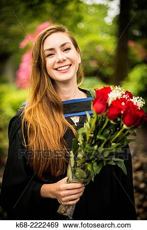 A 22 year old woman in a portrait on her university graduation day. View Large Photo Image Stock Photo - A 22 year old woman in a portrait on her university graduation day.. Fotosearch