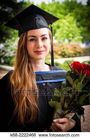 A 22 year old woman in a portrait on her university graduation day. View Large Photo Image Stock Photograph - A 22 year old woman in a portrait on her university graduation day.. Fotosearch