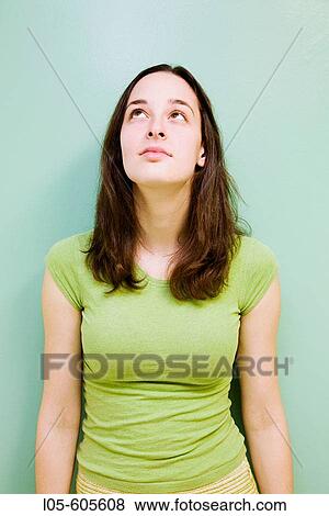 Stock Photo - A 24 year old woman looking up. Fotosearch