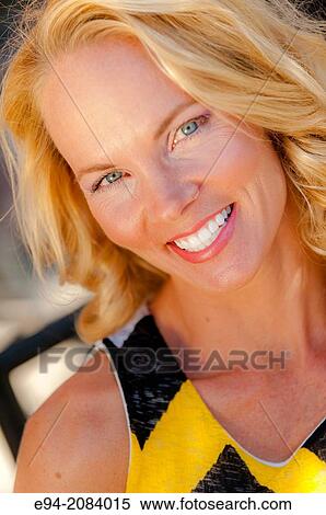 A 39 year old blond woman smiling at the camera. View Large Photo Image Stock Photography - A 39 year old blond woman smiling at the camera.. Fotosearch
