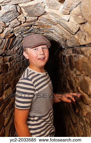 A 9 year old boy at The Forbidden Corner in Middleham, Leyburn, North Yorkshire, England, Britain, Uk. View Large Photo Image Stock Photography - A 9 year old boy at The Forbidden Corner in Middleham, Leyburn, North Yorkshire, England, Britain, Uk.. Fotosearch