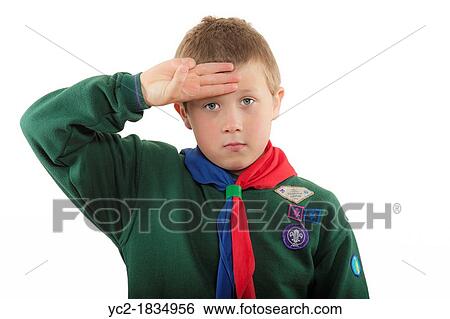 Stock Photograph - A 9 year old boy in his cub scout uniform in the Uk. Fotosearch