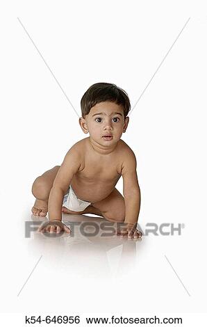 A baby boy crawling. View Large Photo Image Stock Photograph - A baby boy crawling.. Fotosearch