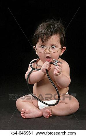 A baby girl with specs and stethoscope. View Large Photo Image Stock Image - A baby girl with specs and stethoscope.. Fotosearch