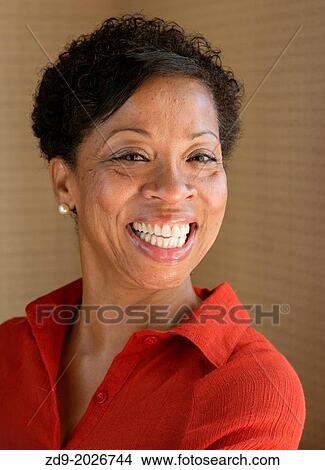 A beautiful smiling black woman with a professional air inspires confidence. View Large Photo Image Picture - A beautiful smiling black woman with a professional air inspires confidence.. Fotosearch