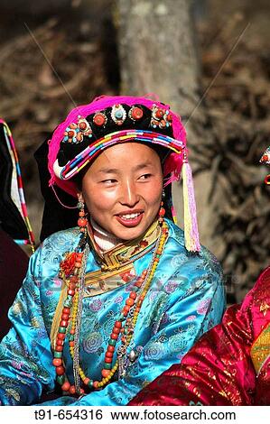a beautiful women from the Zha minority near the village Danba in the Sichuan province, China View Large Photo Image Stock Photograph - a beautiful women from the Zha minority near the village Danba in the Sichuan province, China. Fotosearch