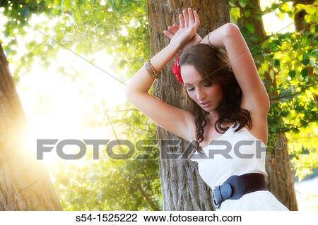 Stock Image - A beautiful young caucasian woman outdoors in Spokane, Washington, USA. Fotosearch
