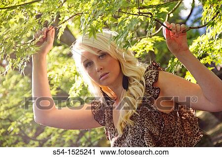 Stock Image - A beautiful young caucasian woman outdoors in Spokane, Washington, USA. Fotosearch