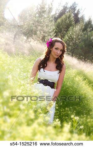 Stock Photograph - A beautiful young caucasian woman outdoors in Spokane, Washington, USA. Fotosearch