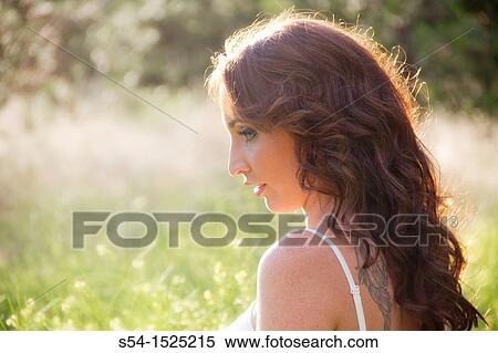 Stock Photography - A beautiful young caucasian woman outdoors in Spokane, Washington, USA. Fotosearch