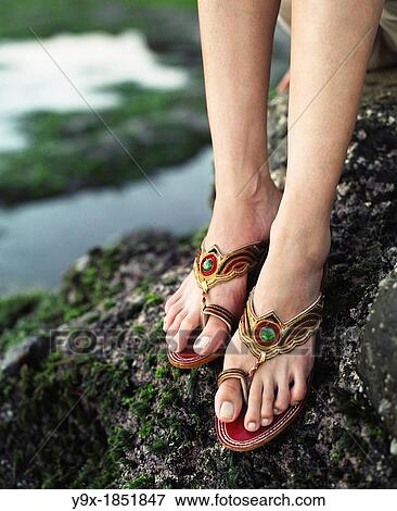 Stock Photo - A beautiful young Pan Asian woman in Bali. Fotosearch