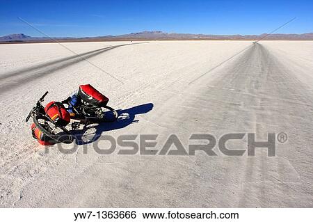 A bicycle lying on the frozen salt lake called? Salar de Uyuni? in Bolivia View Large Photo Image Stock Photograph - A bicycle lying on the frozen salt lake called? Salar de Uyuni? in Bolivia. Fotosearch