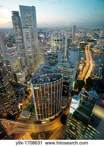 A birds eye view of the Singapore skyline at dusk View Large Photo Image Stock Image - A birds eye view of the Singapore skyline at dusk. Fotosearch