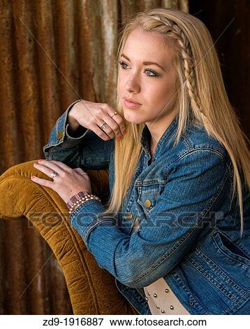 A blonde teenage girl in a pensive mood View Large Photo Image Stock Photo - A blonde teenage girl in a pensive mood. Fotosearch