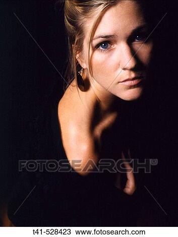A blue-eyed woman in black couture. Shot on 120 film. View Large Photo Image Stock Image - A blue-eyed woman in black couture. Shot on 120 film.. Fotosearch
