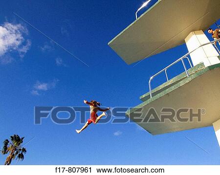 Stock Image - a broken street sign after hurricane.. Fotosearch