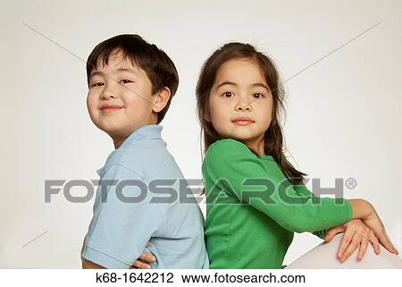 Stock Image - a brother and sister. Fotosearch