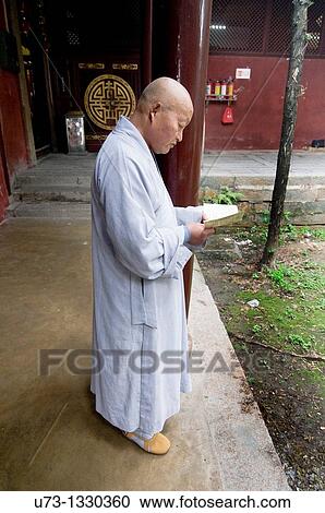 A Buddhist monk in Kaiyan temple in Chaozhou. View Large Photo Image Stock Image - A Buddhist monk in Kaiyan temple in Chaozhou.. Fotosearch