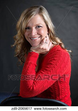 Stock Photo - A California blonde is as beautiful as ever at 40.. Fotosearch