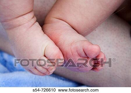 Stock Image - A caucasian baby's feet, 0-6 months. Fotosearch