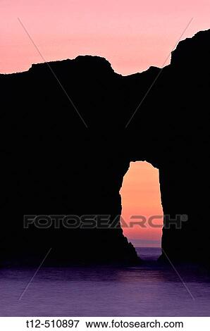 A cave at second beach on the washington coast at sunset View Large Photo Image Stock Photo - A cave at second beach on the washington coast at sunset. Fotosearch