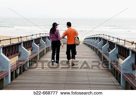 A chinese girl and a western tourist. Taiwan. Republic of China. View Large Photo Image Stock Photo - A chinese girl and a western tourist. Taiwan. Republic of China.. Fotosearch