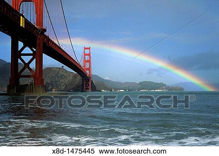 Stock Photography - A clearing storm yields a rainbow over the Golden Gate Bridge in San Francisco, California, United States of America. Fotosearch