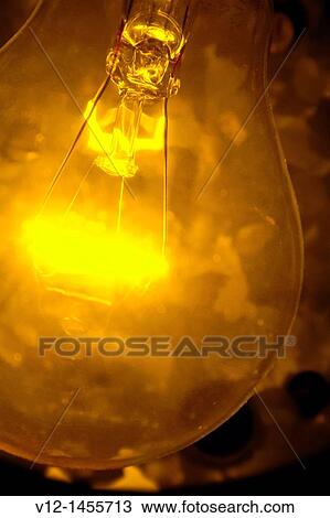 A close up of light bulb and filament View Large Photo Image Stock Image - A close up of light bulb and filament. Fotosearch