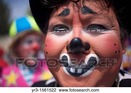Stock Image - A clown smiles during the 16th International Clown Convention: The Laughter Fair organized by the Latino Clown Brotherhood, in Mexico City, October 17, 2011. Fotosearch
