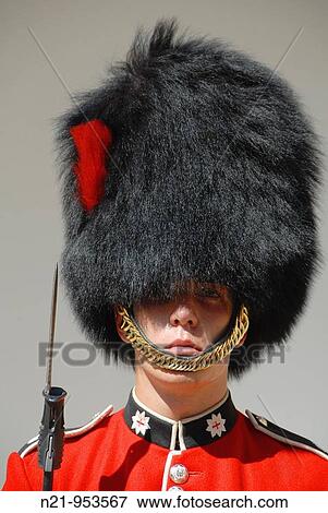 Stock Photo - A Coldstream guard of the Coldstream Regiment of Foot Guards. Jewel House, Tower of London. London, Great Britain, Europe.. Fotosearch