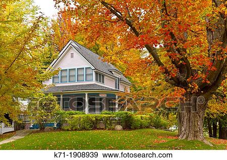 A Colonial home with fall foliage color in Petoskey, Michigan, USA View Large Photo Image Stock Photo - A Colonial home with fall foliage color in Petoskey, Michigan, USA. Fotosearch