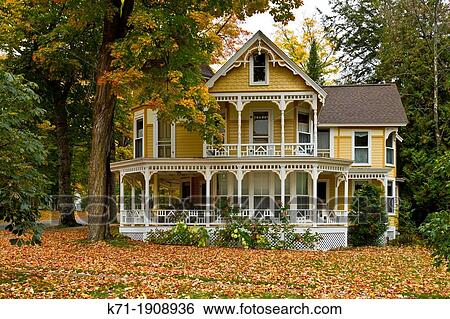 A Colonial home with fall foliage color in Petoskey, Michigan, USA View Large Photo Image Stock Photograph - A Colonial home with fall foliage color in Petoskey, Michigan, USA. Fotosearch