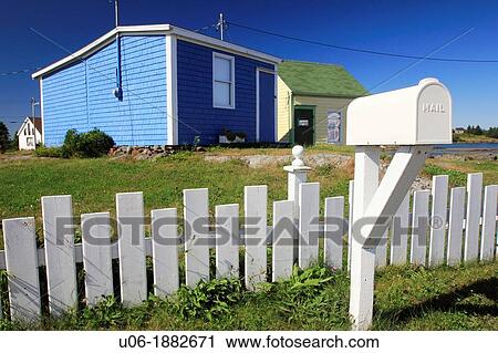 Stock Image - a colorful cabin and mailbox at the village of Blue Rocks, Nova Scotia. Fotosearch