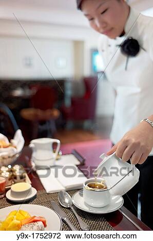 A complimentary Western styled breakfast consisting of a omelette, small side salad, croissants, and coffee View Large Photo Image Stock Image - A complimentary Western styled breakfast consisting of a omelette, small side salad, croissants, and coffee. Fotosearch