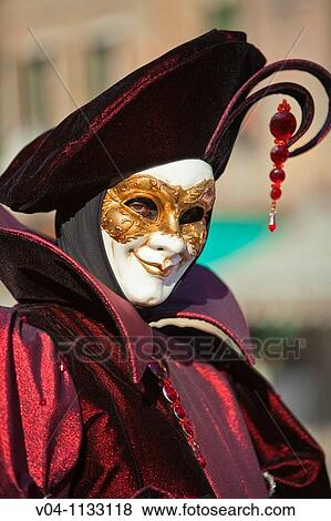 Stock Photo - A costumed man at the carnival in Venice, Italy, Europe. Fotosearch