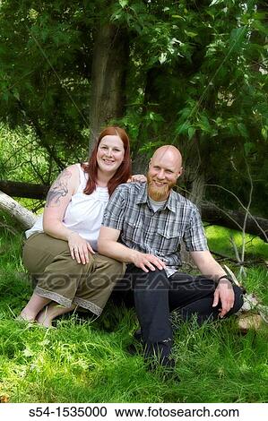 Stock Image - A couple, 30-35 years, in Spokane, Washington, USA.. Fotosearch