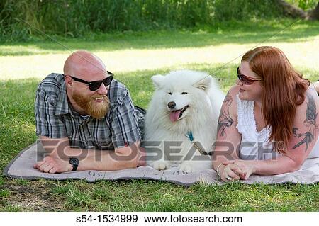Stock Photo - A couple, 30-35 years, in Spokane, Washington, USA.. Fotosearch