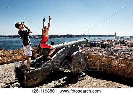 A couple enjoying the view from the Castle of St. George. Lisbon, Portugal View Large Photo Image Stock Image - A couple enjoying the view from the Castle of St. George. Lisbon, Portugal. Fotosearch