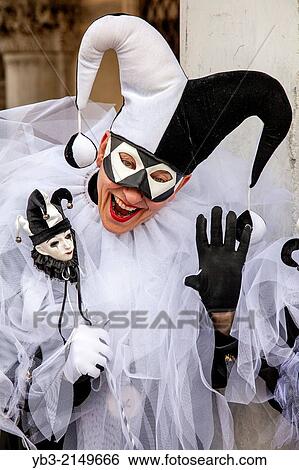 Stock Photograph - A Couple In Jester Costumes, Venice Carnival, Venice, Italy.. Fotosearch