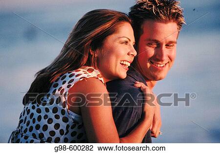 A couple in love and enjoying the beach in Santa Cruz, California View Large Photo Image Stock Image - A couple in love and enjoying the beach in Santa Cruz, California. Fotosearch